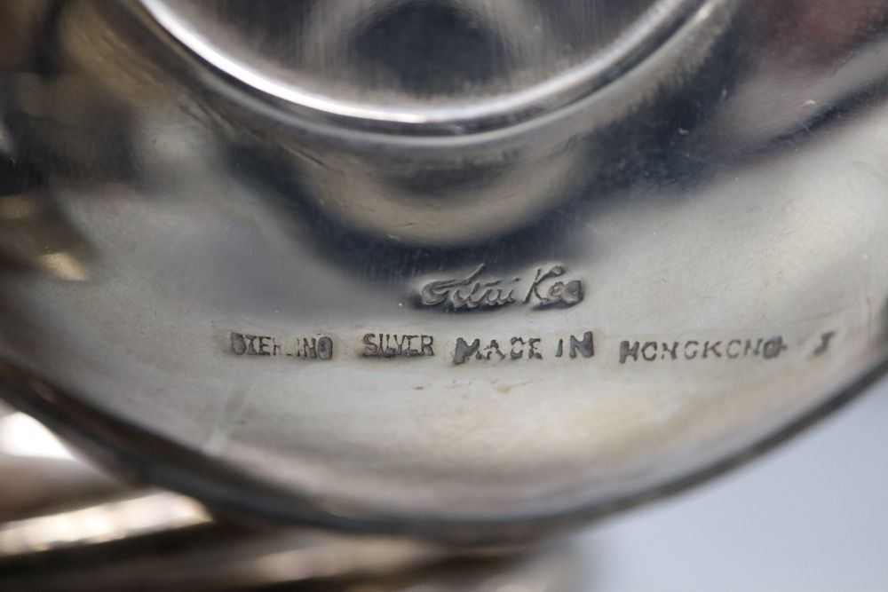 Six Hong Kong sterling dishes, with inset coin and three napkin rings.